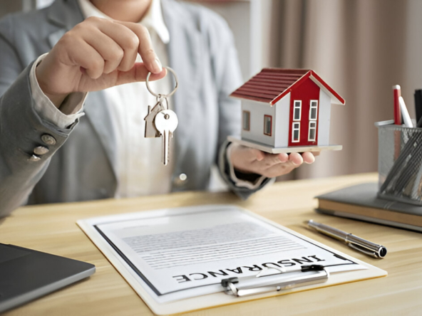 "Real estate agent handing over house keys to new homeowner during property handover process."